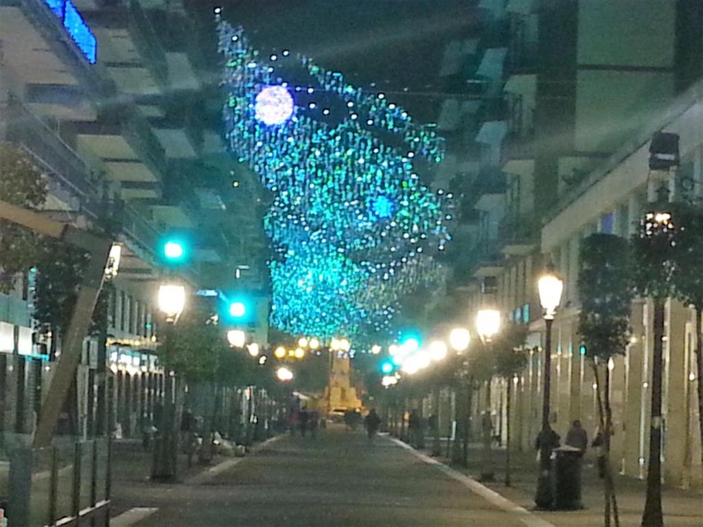 a street at night with a bunch of lights at B&B Santa Rosa in Salerno