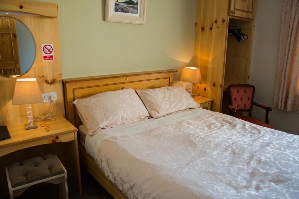 Postel nebo postele na pokoji v ubytování Algret House B&B