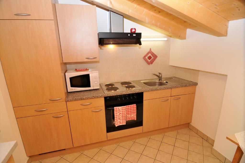 Kuchyň nebo kuchyňský kout v ubytování Hotel Garni Walter
