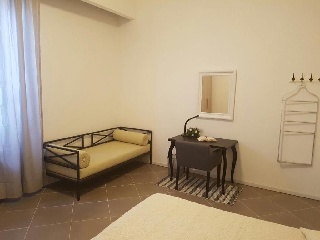 Postel nebo postele na pokoji v ubytování B&B Piazza Dante Nuoro