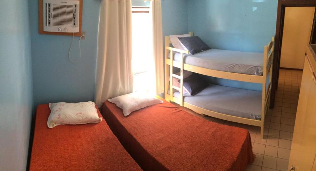 Двуетажно легло или двуетажни легла в стая в Flat Summer House em Guarajuba