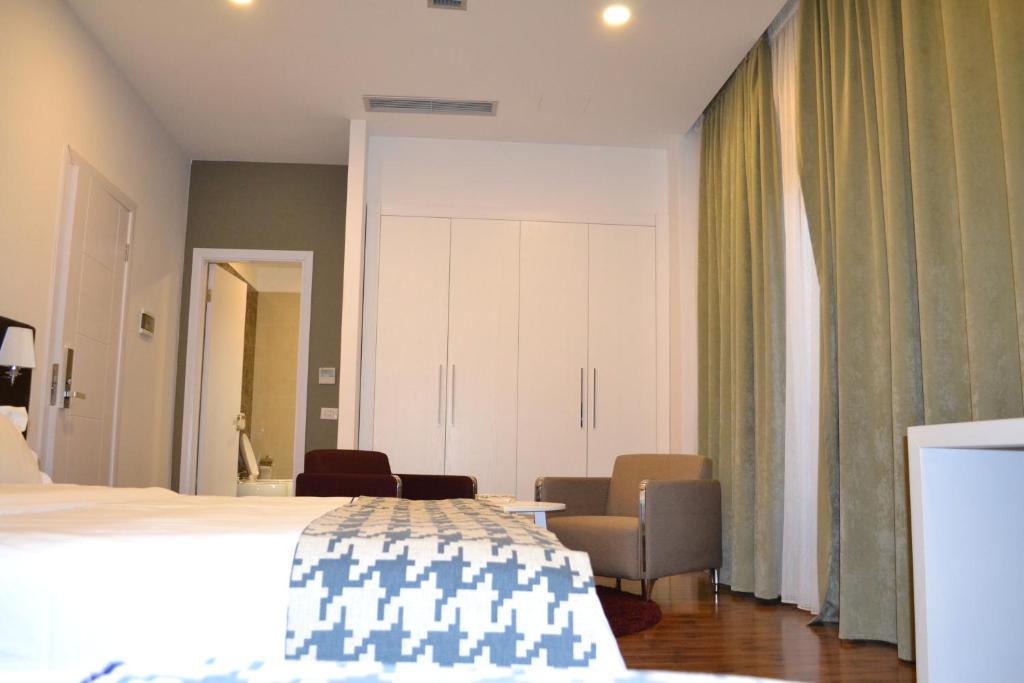 Postel nebo postele na pokoji v ubytování Havana Hotel