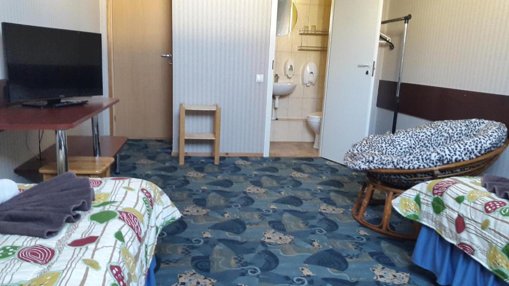 Postel nebo postele na pokoji v ubytování Terve Hostel