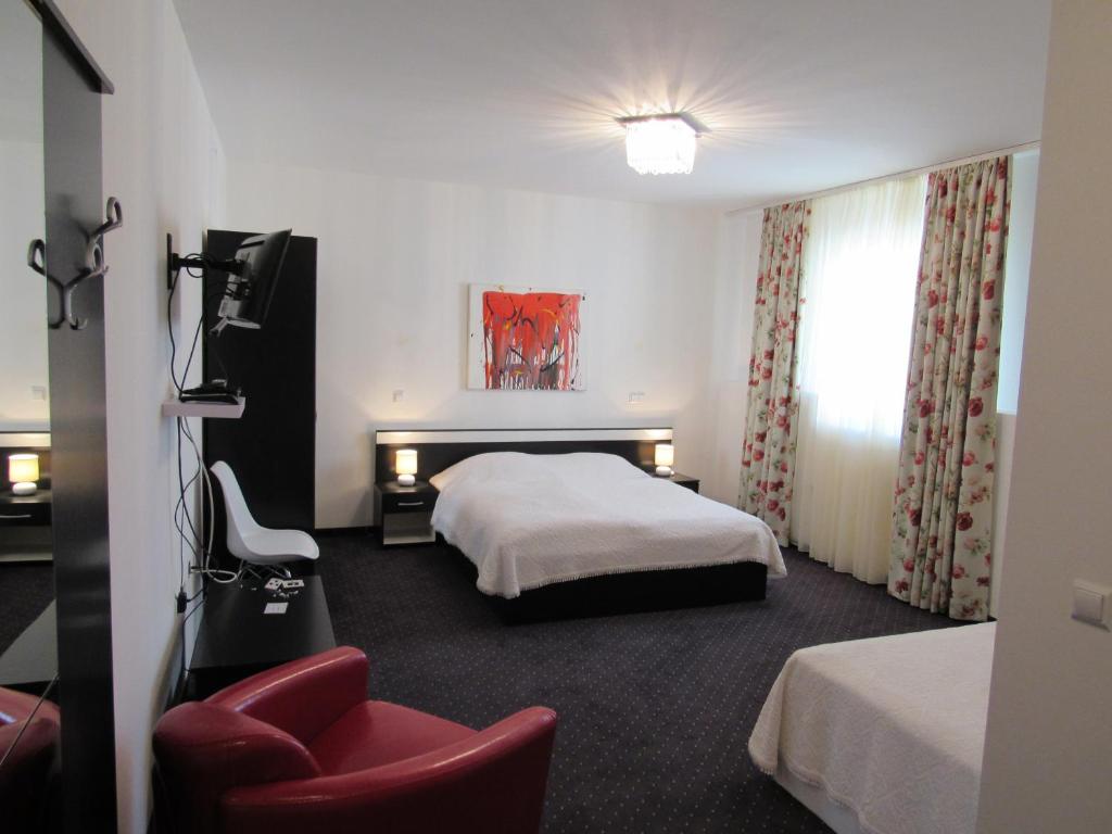 Postel nebo postele na pokoji v ubytování Guest House Klaudija