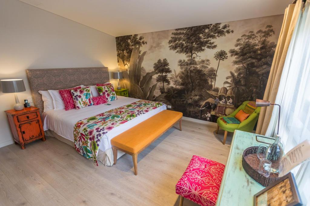 Postel nebo postele na pokoji v ubytování Patio del Mundo