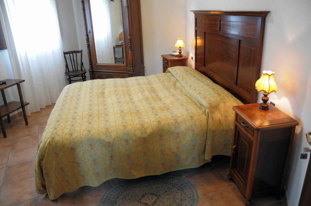 Posteľ alebo postele v izbe v ubytovaní Agriturismo-R&B Corte dei Gioghi
