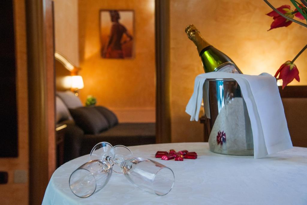 Postel nebo postele na pokoji v ubytování Hotel Al Ritrovo