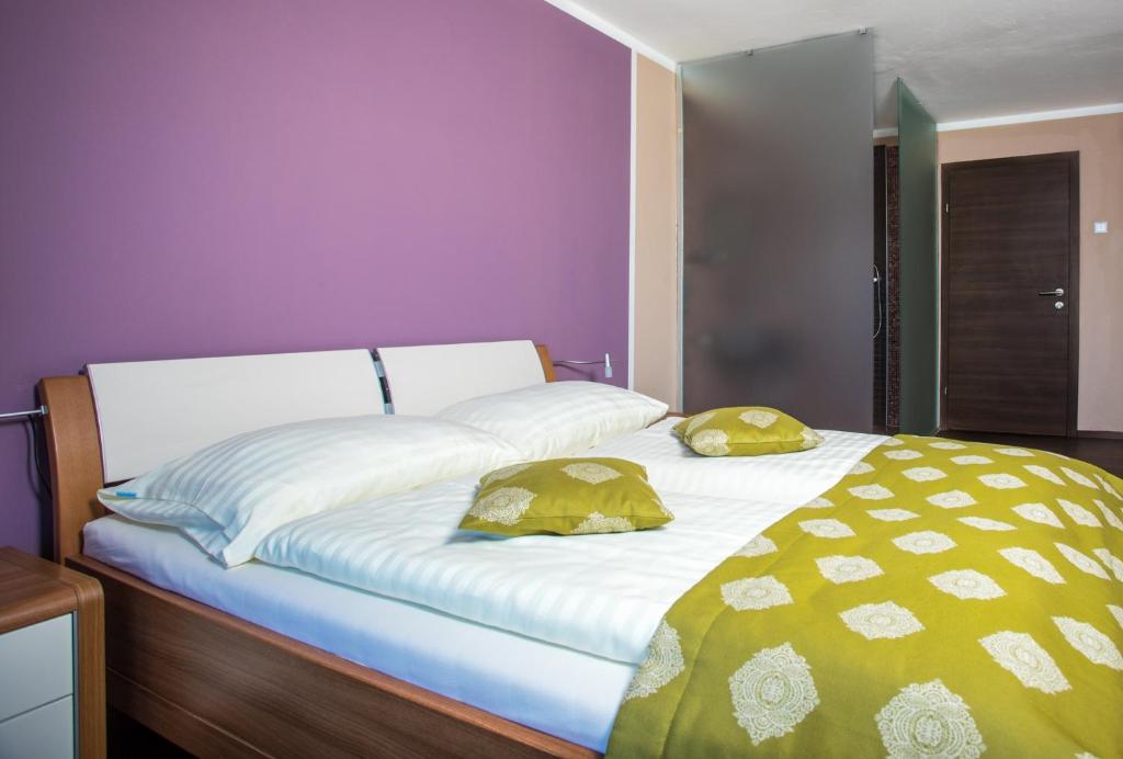 Voodi või voodid majutusasutuse Hotel Faaker See Inn by S4Y toas