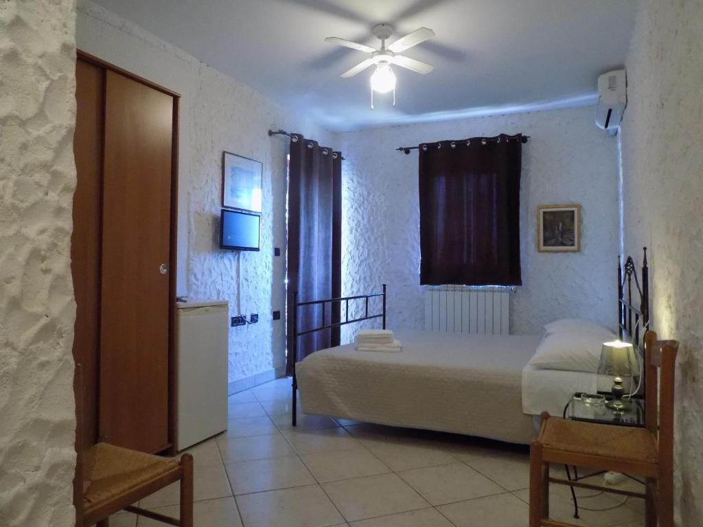 Postel nebo postele na pokoji v ubytování Rooms and Apartment Feral