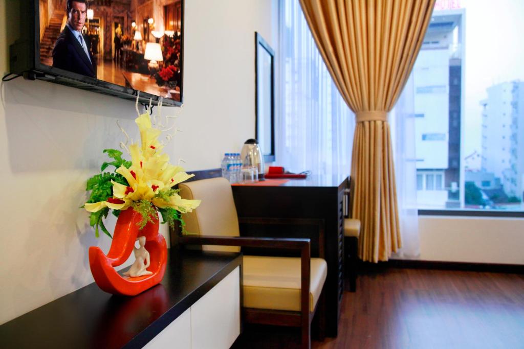 TV a/nebo společenská místnost v ubytování May Hotel