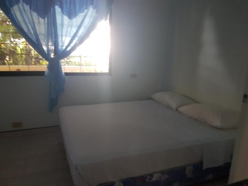 Postel nebo postele na pokoji v ubytování Villa Juana