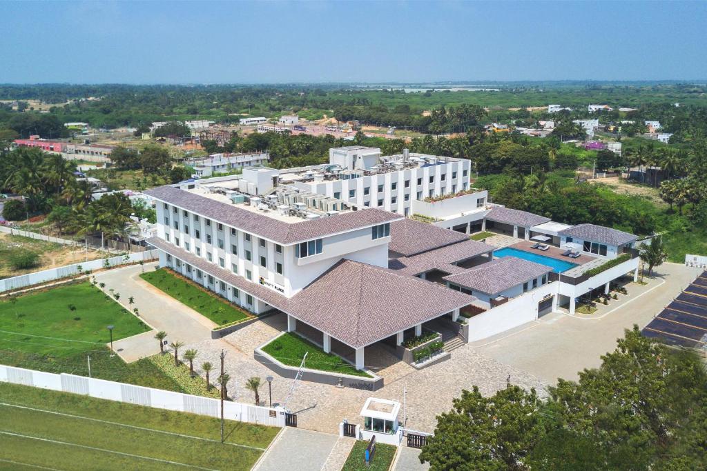 an aerial view of a large white building at The Residency Towers, Rameswaram in Rāmeswaram