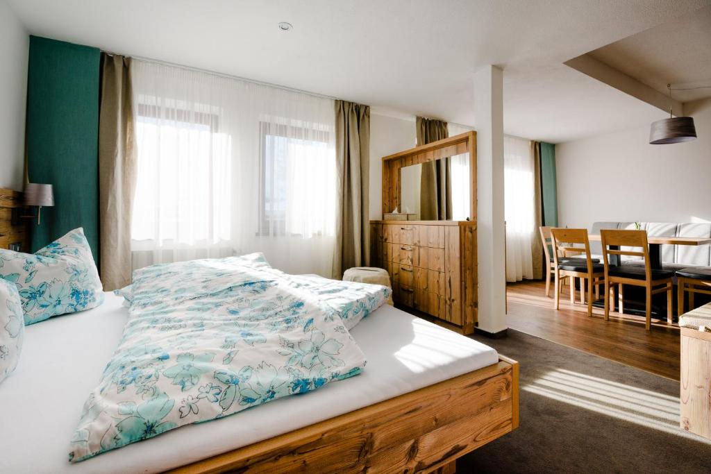 Postel nebo postele na pokoji v ubytování Garni Stefani