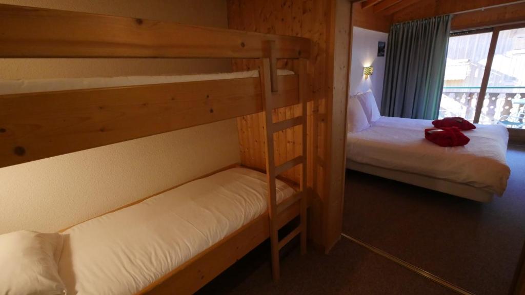 Postel nebo postele na pokoji v ubytování Hotel Bel'alpe