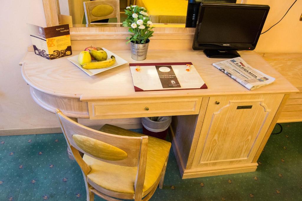 Kuchyň nebo kuchyňský kout v ubytování Hotel San Clemente