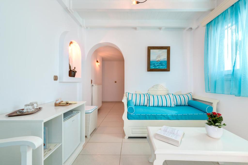 Postel nebo postele na pokoji v ubytování Ellinon Thea Boutique Hotel