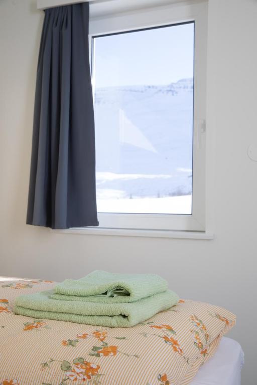 Postel nebo postele na pokoji v ubytování Guesthouse Baegisa