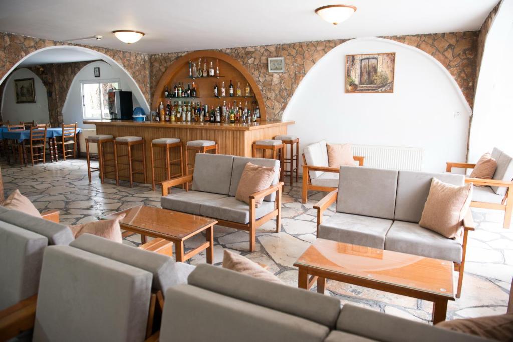 Posezení v ubytování Le Village Hotel