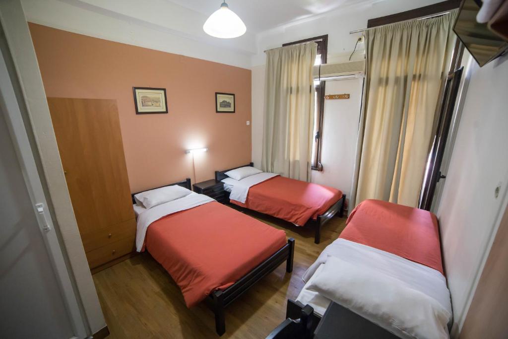 Posteľ alebo postele v izbe v ubytovaní Tempi Hotel