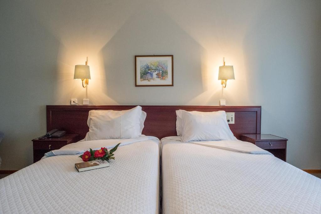 Postel nebo postele na pokoji v ubytování Hotel Boavista II