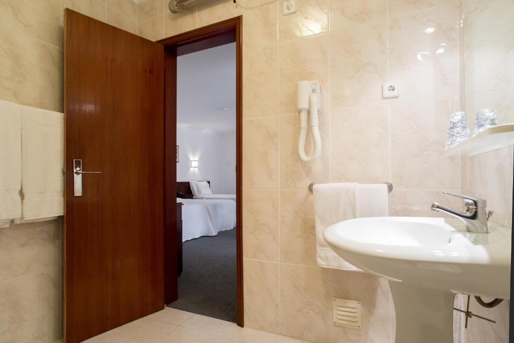 Koupelna v ubytování Hotel Boavista II