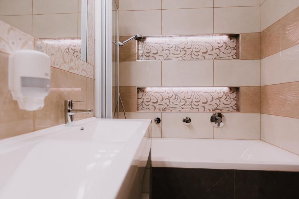 Koupelna v ubytování Németh Apartmanházak