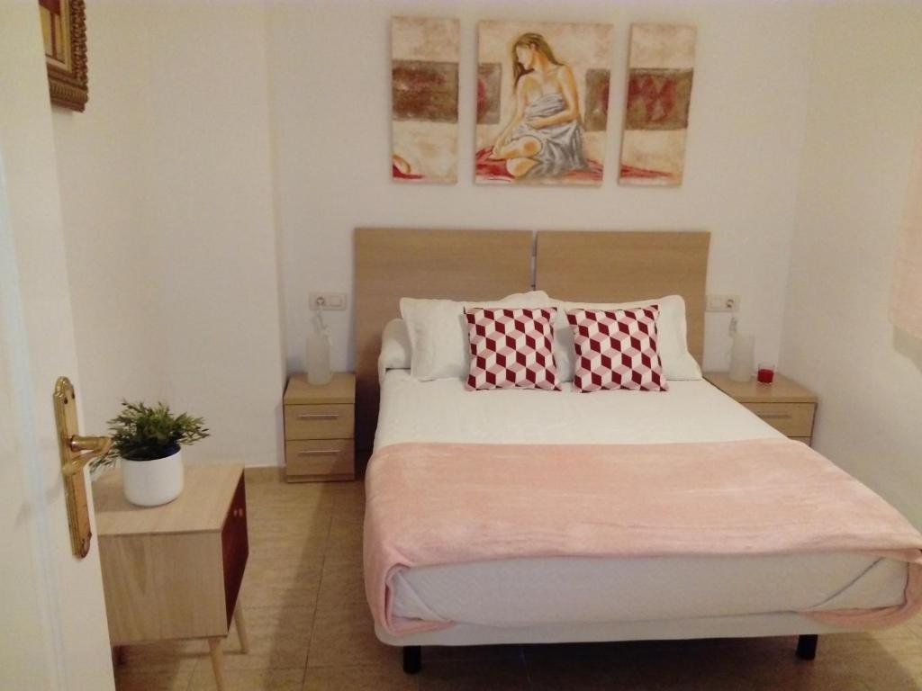 Posteľ alebo postele v izbe v ubytovaní Apartamento Dos Aceras