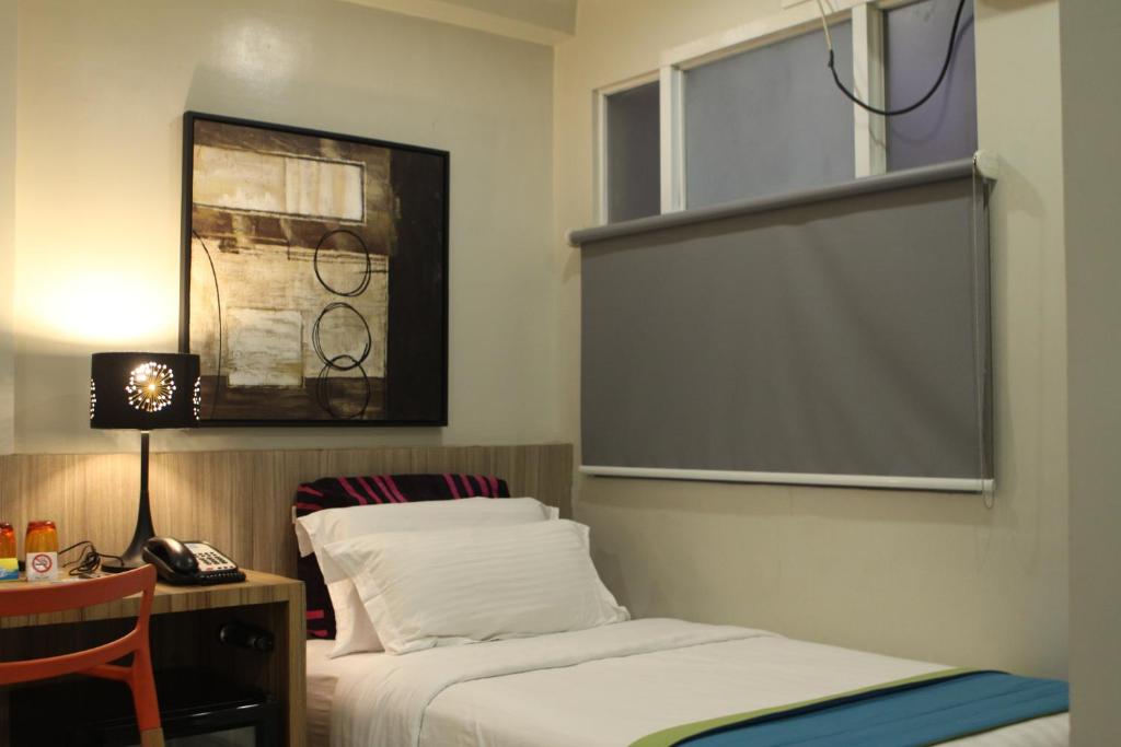 Letto o letti in una camera di Z Pad Residences