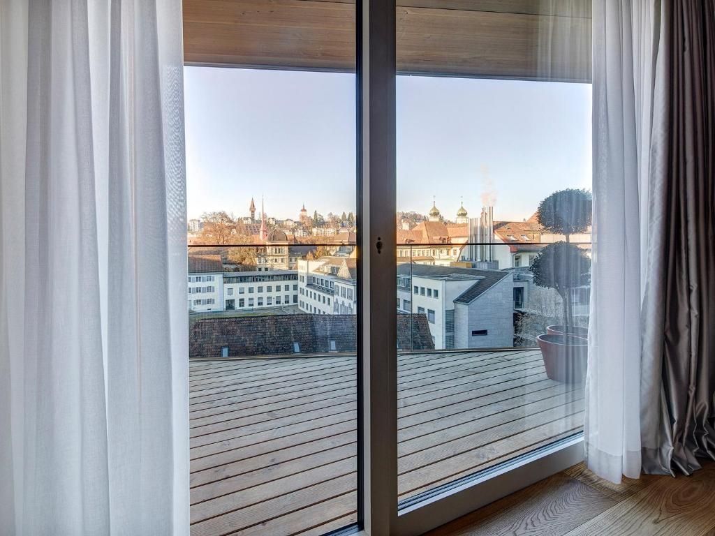 Uma varanda ou terraço em Hotel Anker Luzern