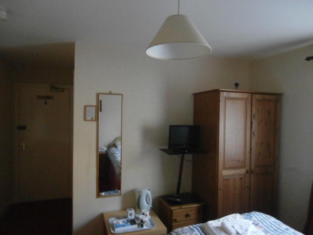Postel nebo postele na pokoji v ubytování Monorene Guest House