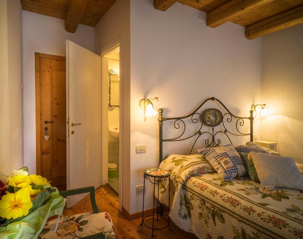 Postel nebo postele na pokoji v ubytování Casa Fiorina