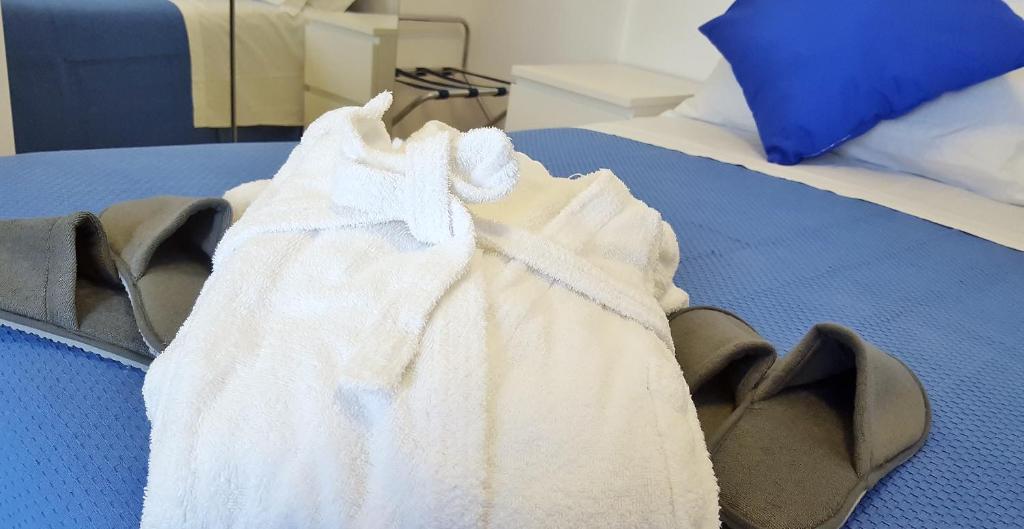 Кровать или кровати в номере Hotel Mare Blu -- boutique