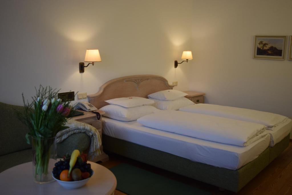 Postel nebo postele na pokoji v ubytování Hotel Landhaus Fuhrgassl-Huber