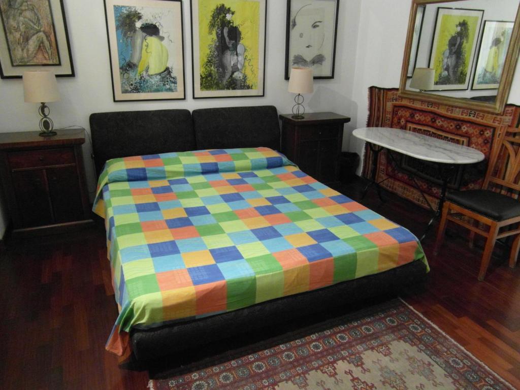 A bed or beds in a room at Abitazione Pigneto B&B