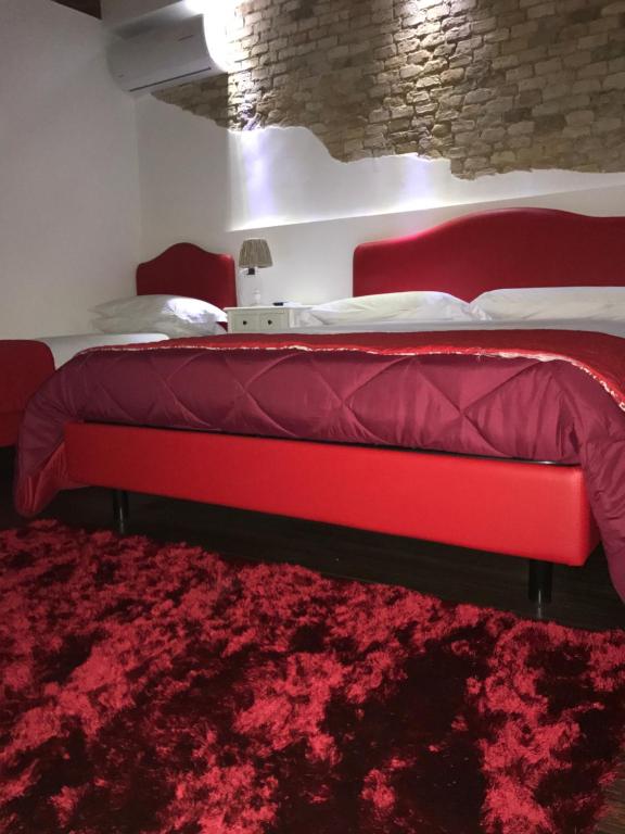 Postel nebo postele na pokoji v ubytování B&B S.Antonio