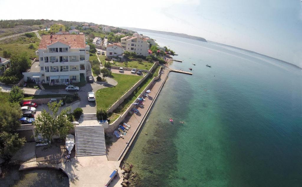 an aerial view of a resort and the ocean at Apartments Vila 4m in Ražanac