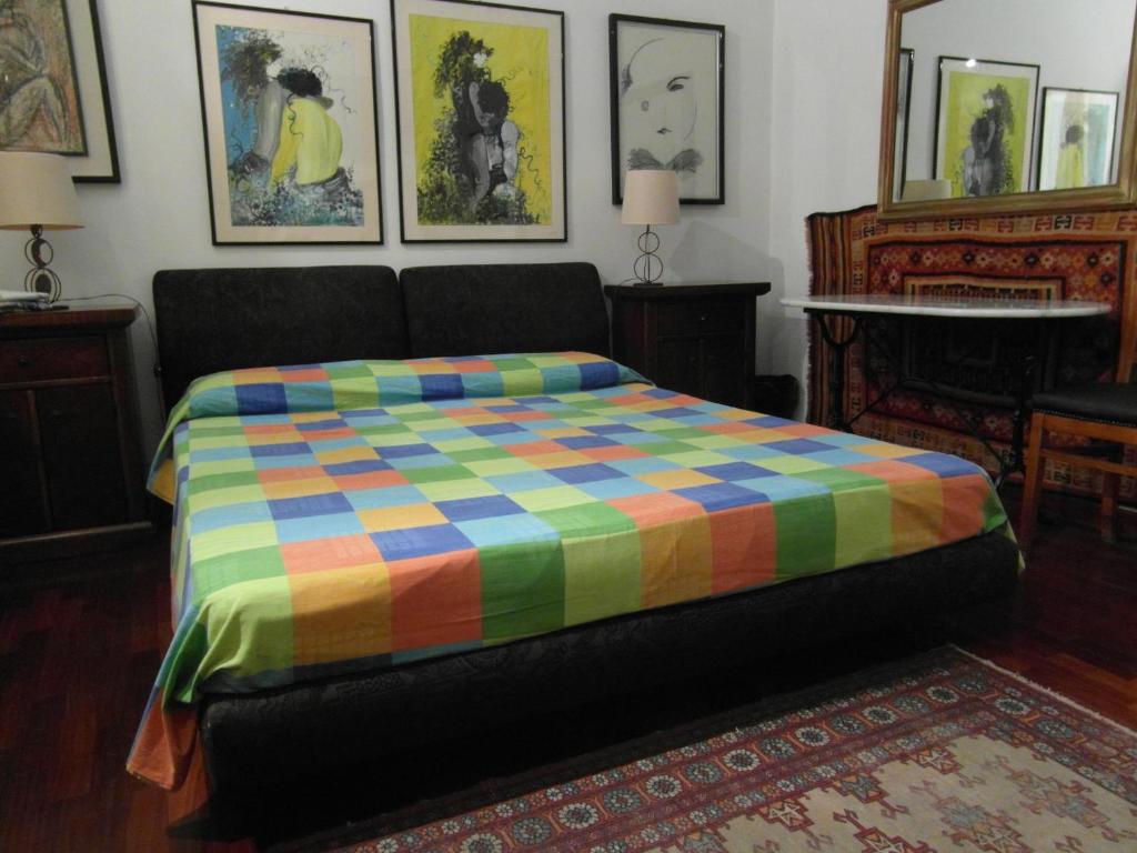 A bed or beds in a room at Abitazione Pigneto B&B