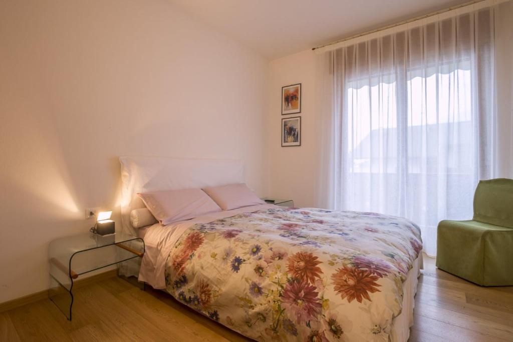Postel nebo postele na pokoji v ubytování Ca' Ada