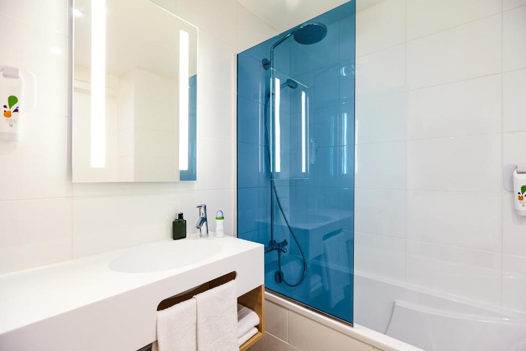 Koupelna v ubytování ibis Styles Toulouse Nord Sesquieres