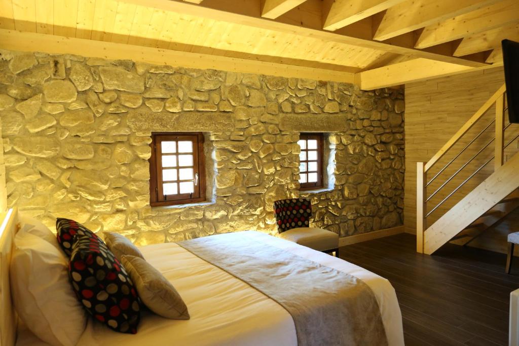Postel nebo postele na pokoji v ubytování Le Vieux Logis