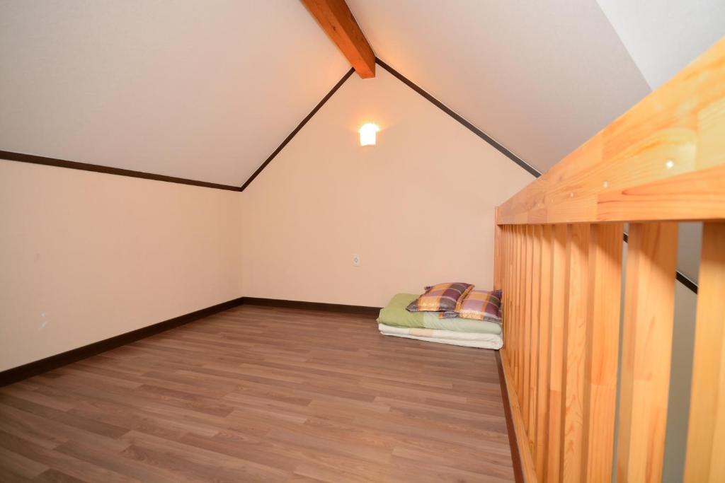 Postel nebo postele na pokoji v ubytování Daea Ulleung Resort