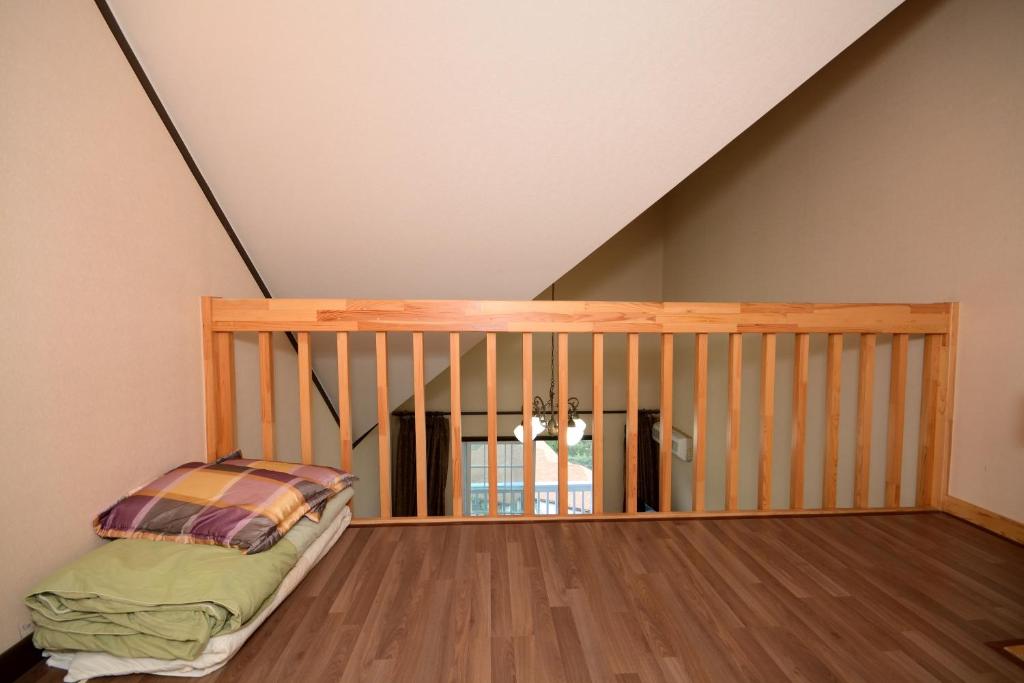 Postel nebo postele na pokoji v ubytování Daea Ulleung Resort