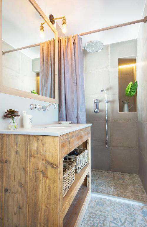 Kúpeľňa v ubytovaní The Beach House Studios & Suites