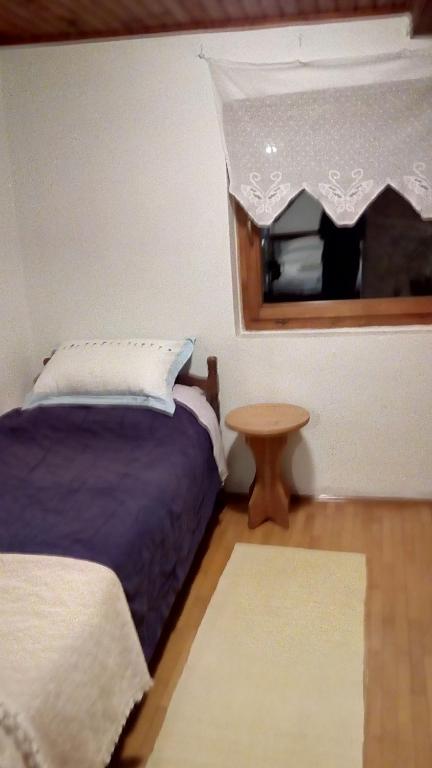 Postel nebo postele na pokoji v ubytování Guesthouse Nina