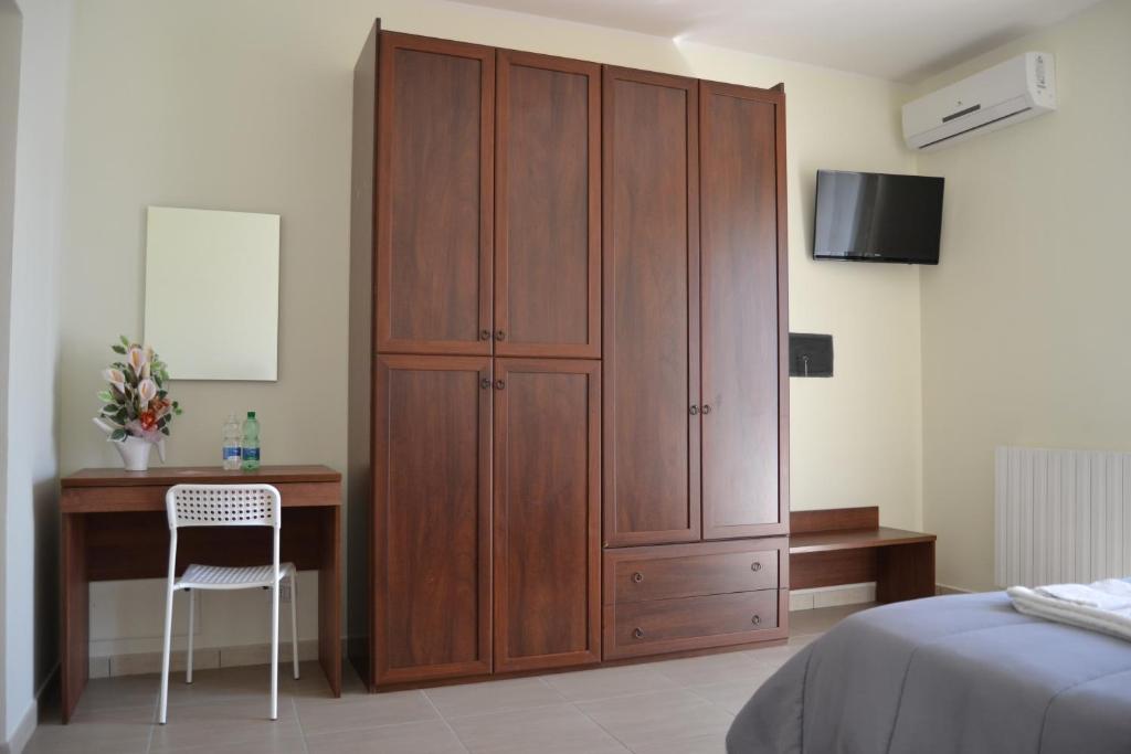 Postel nebo postele na pokoji v ubytování Guesthouse Holiday Formia beach