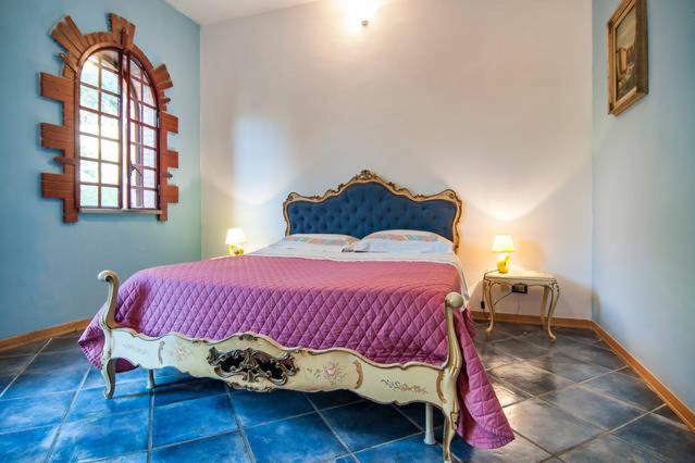 A bed or beds in a room at C'era una volta