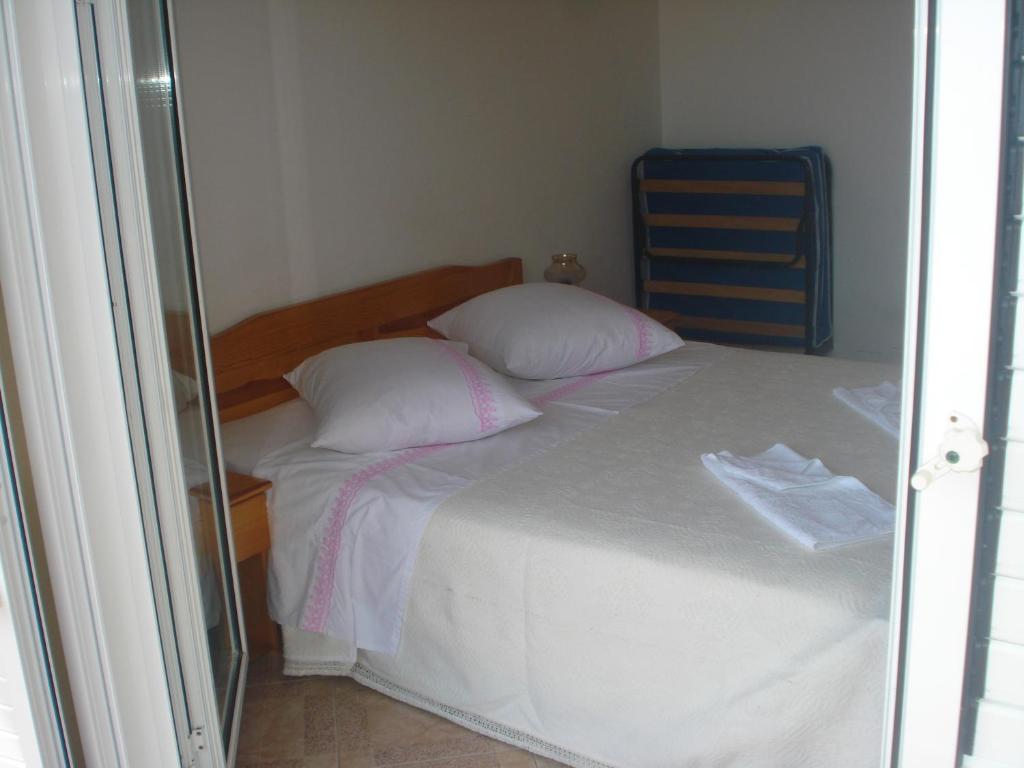 Posteľ alebo postele v izbe v ubytovaní Apartments San Giorgio