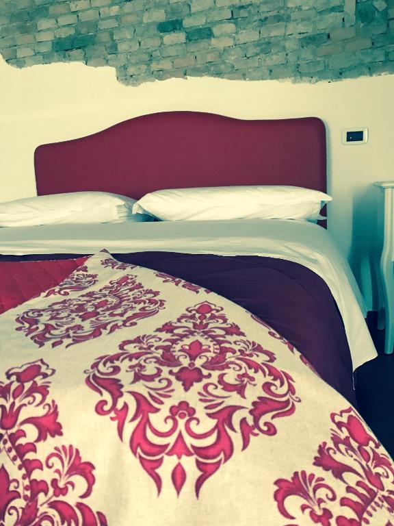 Postel nebo postele na pokoji v ubytování B&B S.Antonio
