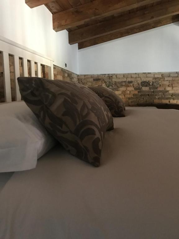 Postel nebo postele na pokoji v ubytování B&B S.Antonio