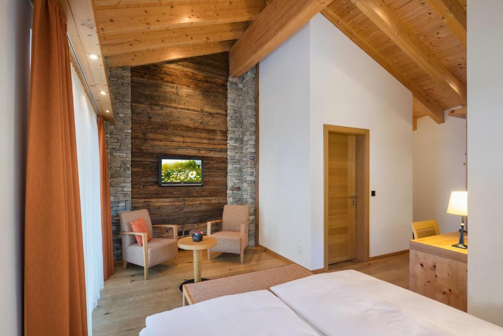 Postel nebo postele na pokoji v ubytování Hotel Phoenix
